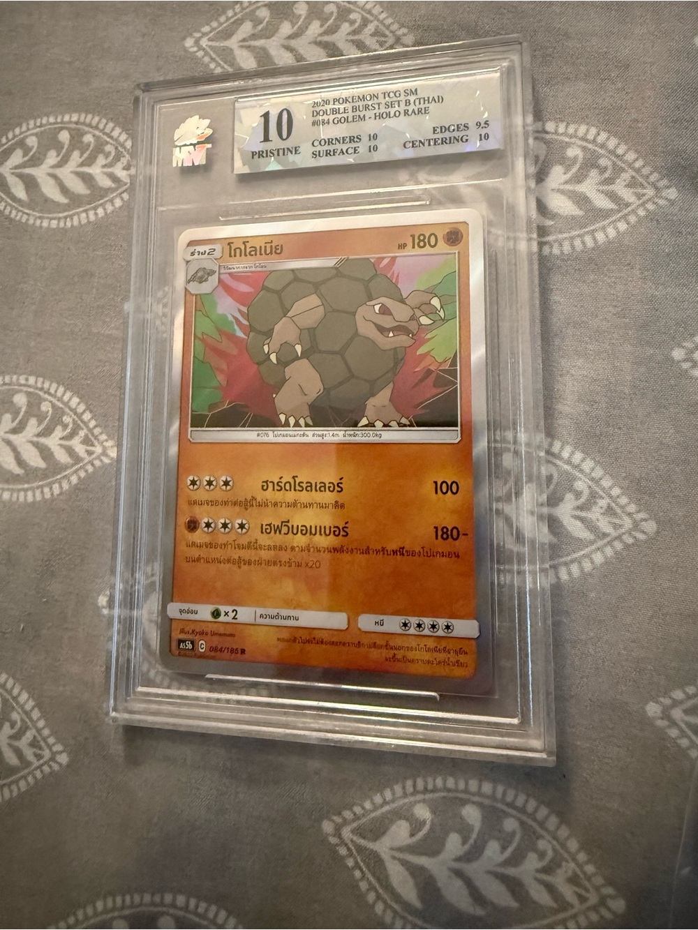Pokemon Golem Holo Rare Card — Orange and Brown Artwork